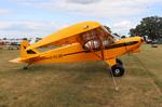 Aircraft C-FLQE, Piper PA-18, at KOSH, photo by MarkPasqualino