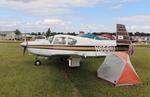 Aircraft N6561U, Mooney M20C, at KOSH, photo by MarkPasqualino
