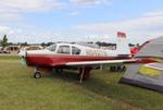 Aircraft N942TB, Mooney M20C, at KOSH, photo by MarkPasqualino