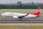 Aircraft 4L-TGM, Air Zena 737-700, at LOWW, photo by Andy Graf