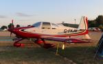 Aircraft C-FKJM, Vans RV-10, at KOSH, photo by MarkPasqualino