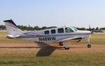 Aircraft N48WW, Beech A36, at KOSH, photo by MarkPasqualino