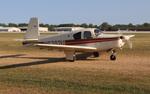 Aircraft N6702U, Mooney M20C, at KOSH, photo by MarkPasqualino