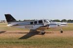 Aircraft N581E, Beech 58, at KOSH, photo by MarkPasqualino