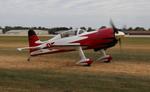 Aircraft N69PE, Radial Rocket, at KOSH, photo by MarkPasqualino