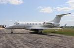 Aircraft N199BA, Embraer EMB-505 Phenom 300, at KOSH, photo by MarkPasqualino