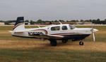 Aircraft N252RD, Mooney M20K, at KOSH, photo by MarkPasqualino