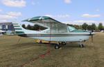 Aircraft N6980M, Cessna T210M, at KOSH, photo by MarkPasqualino