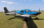 Aircraft N55MM, Cirrus SR22T, at KOSH, photo by MarkPasqualino