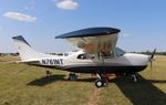 Aircraft N761NT, Cessna 210M, at KOSH, photo by Mark Pasqualino