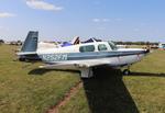 Aircraft N252FM, Mooney M20K, at KOSH, photo by MarkPasqualino