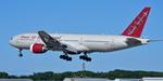 Aircraft N819AX, CAMBER510 over the numbers for RW34, at KPSM, photo by topgunphotography