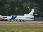 Aircraft N18CG, Falcon 900, at KELM, photo by planestuff