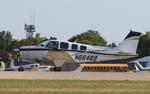Aircraft N66489, Beech A36, at KOSH, photo by MarkPasqualino