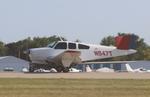 Aircraft N947T, Beech V35B, at KOSH, photo by MarkPasqualino