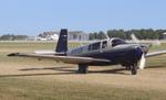 Aircraft N101DX, Mooney M20R, at KOSH, photo by MarkPasqualino