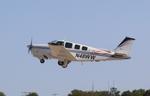 Aircraft N48WW, Beech A36, at KOSH, photo by MarkPasqualino