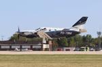 Aircraft PS-TBM, Daher TBM-960, at KOSH, photo by MarkPasqualino
