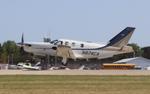 Aircraft N874CA, Socata TBM-700, at KOSH, photo by MarkPasqualino
