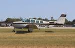 Aircraft N6023Q, Beech A36, at KOSH, photo by MarkPasqualino