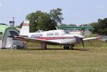 Aircraft N4052H, Mooney M20J, at KOSH, photo by MarkPasqualino