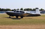 Aircraft N9149P, Mooney M20M, at KOSH, photo by MarkPasqualino