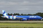 Aircraft N971JT, JetBlue 266 departs Southwest Florida International Airport enroute to Boston-Logan International Airport, at KRSW, photo by Suncoast Spotter