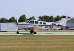 Aircraft N57RB, Beech A36, at KOSH, photo by MarkPasqualino