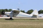 Aircraft N97936, Stinson 108, at KOSH, photo by MarkPasqualino