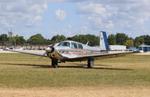 Aircraft N65GL, Mooney M20E, at KOSH, photo by MarkPasqualino
