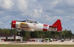 Aircraft N3195G, North American SNJ-5, at KOSH, photo by MarkPasqualino