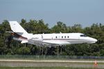 Aircraft N940QS, Execjet 940 arrives at Southwest Florida International Airport following flight from Hartsfield-Jackson Atlanta International Airport, at KRSW, photo by Suncoast Spotter