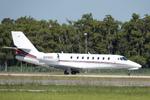 Aircraft N313QS, Execjet 313 departs Southwest Florida International Airport enroute to Spirit of St Louis Airport, at KRSW, photo by Suncoast Spotter