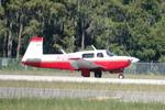 Aircraft N1036U, Mooney 1036U departs Southwest Florida International Airport enroute to Nashville John C Tune Airport, at KRSW, photo by Suncoast Spotter