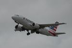 Aircraft N757UW, American 2916 departs Southwest Florida International Airport enroute to Reagan National Airport, at KRSW, photo by Suncoast Spotter