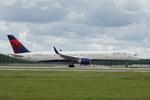 Aircraft N589NW, Delta 2001 departs Southwest Florida International Airport enroute to Detroit Metro Airport, at KRSW, photo by Suncoast Spotter