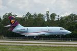 Aircraft N215RE, Falcon 215RE arrives at Southwest Florida International Airport following flight from Naples Airport, at KRSW, photo by Suncoast Spotter