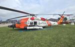 Aircraft 6014, USCG MH-60 zx, at KOSH, photo by FloridaMetal