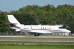 Aircraft N664QS, Execjet 664 departs Southwest Florida International Airport enroute to Ocean Reef Airport, at KRSW, photo by Suncoast Spotter