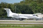 Aircraft N301AZ, Phenom 301AZ departs Southwest Florida International Airport enroute to John C Tune Airport, at KRSW, photo by Suncoast Spotter