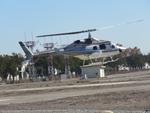 Aircraft N230MK, Practicing in-ground-effect hovering north side, at POC, photo by Helicopterfriend