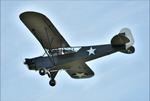 Aircraft G-AXGP, Piper J3C-90 Cub departing Popham Airfield following the 50th anniversary fly-in, at EGHP, photo by Mike_Y