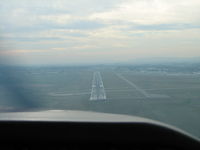  - On Final RWY 23 at FDK.  Count the planes on the airport.  1 on the Rwy and 4 on the taxi ways.  Taxiing in I noticed that the plane behind us had to leave the pattern for aircraft entering the runway.  This is a slow day at Maryland's 2nd busiest airport - by Sam Andrews