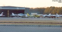  - A view of the parking apron at sunset - by Paul Perry