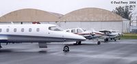  - Rainy day, but a nice, tight lineup on the ramp - by Paul Perry