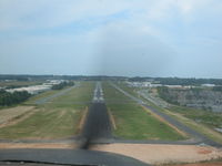  - short final rwy 27 showing rwy extention construction - by David McClendon
