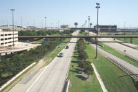  - Taken from aircraft taxiing over airport streets - by Bill Larkins