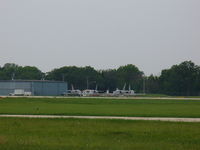  - Flight of four L-39 aircraft taxing at KRFD - by Mark Pasqualino