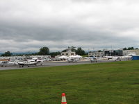  - This is the Frederick Flight Center ramp.  On any other day there would not be the white tents in front of the old tower, but this was AOPA Fly-in day. - by Sam Andrews