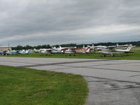  - These are the local planes.  The fly-in planes are way behind them. - by Sam Andrews